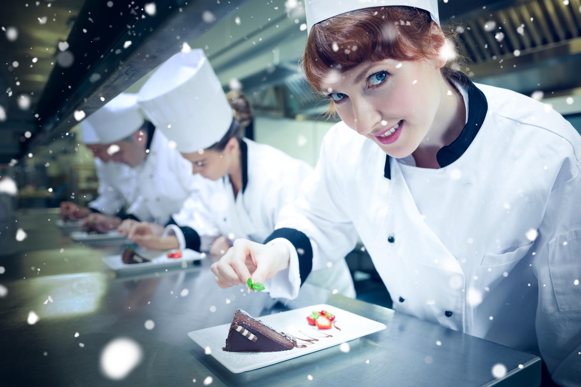 students cooking together in high-tech kitchen