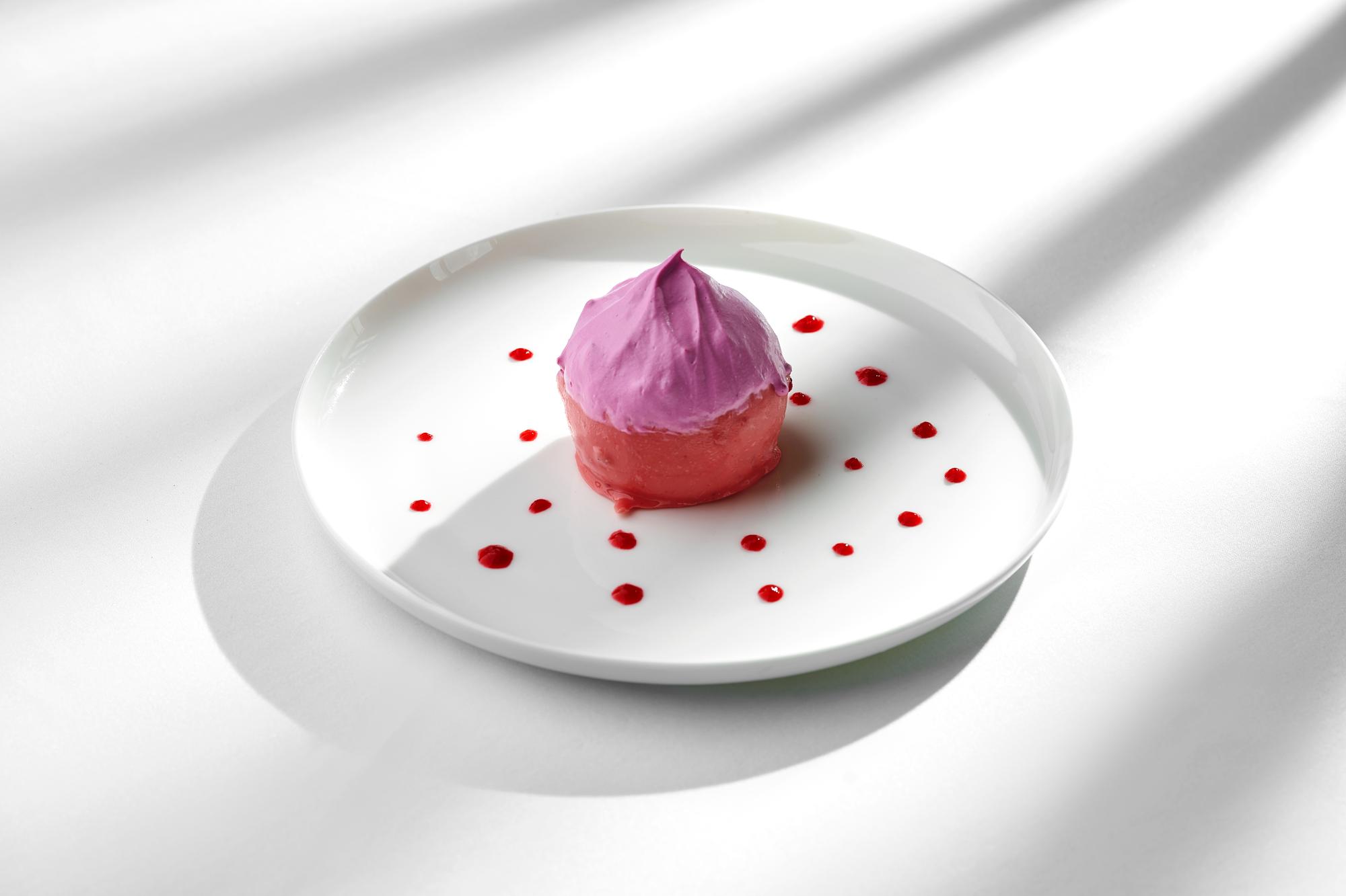 close shot of plated dessert with geometric garnish